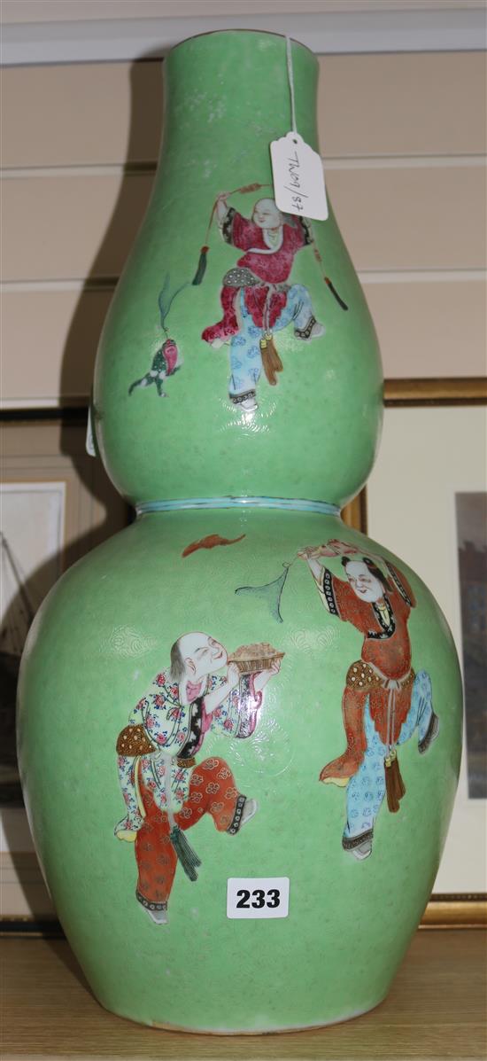 A large 19th century Chinese green ground double gourd phoenix vase, H 57.5cm (restored)